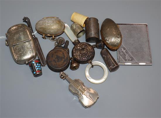 Mixed collectables including plated sovereign/vesta case, thimbles, violin vesta, rattle, silver bookmark etc.